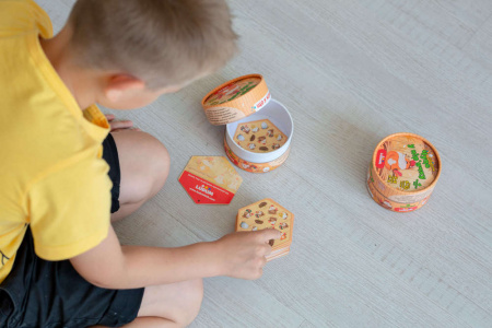 Книга Гра-викриття настільна "Чудо у пір'ячку", тубус маленький