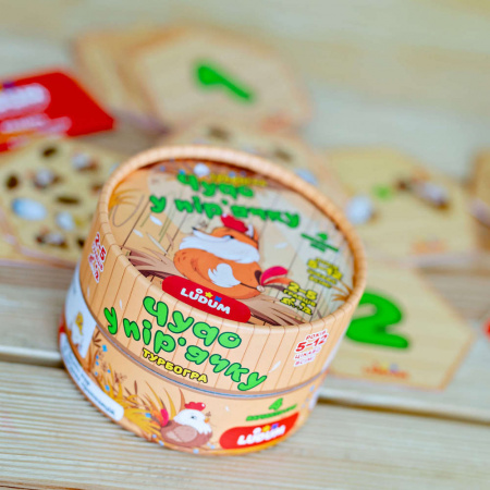 Книга Гра-викриття настільна "Чудо у пір'ячку", тубус маленький